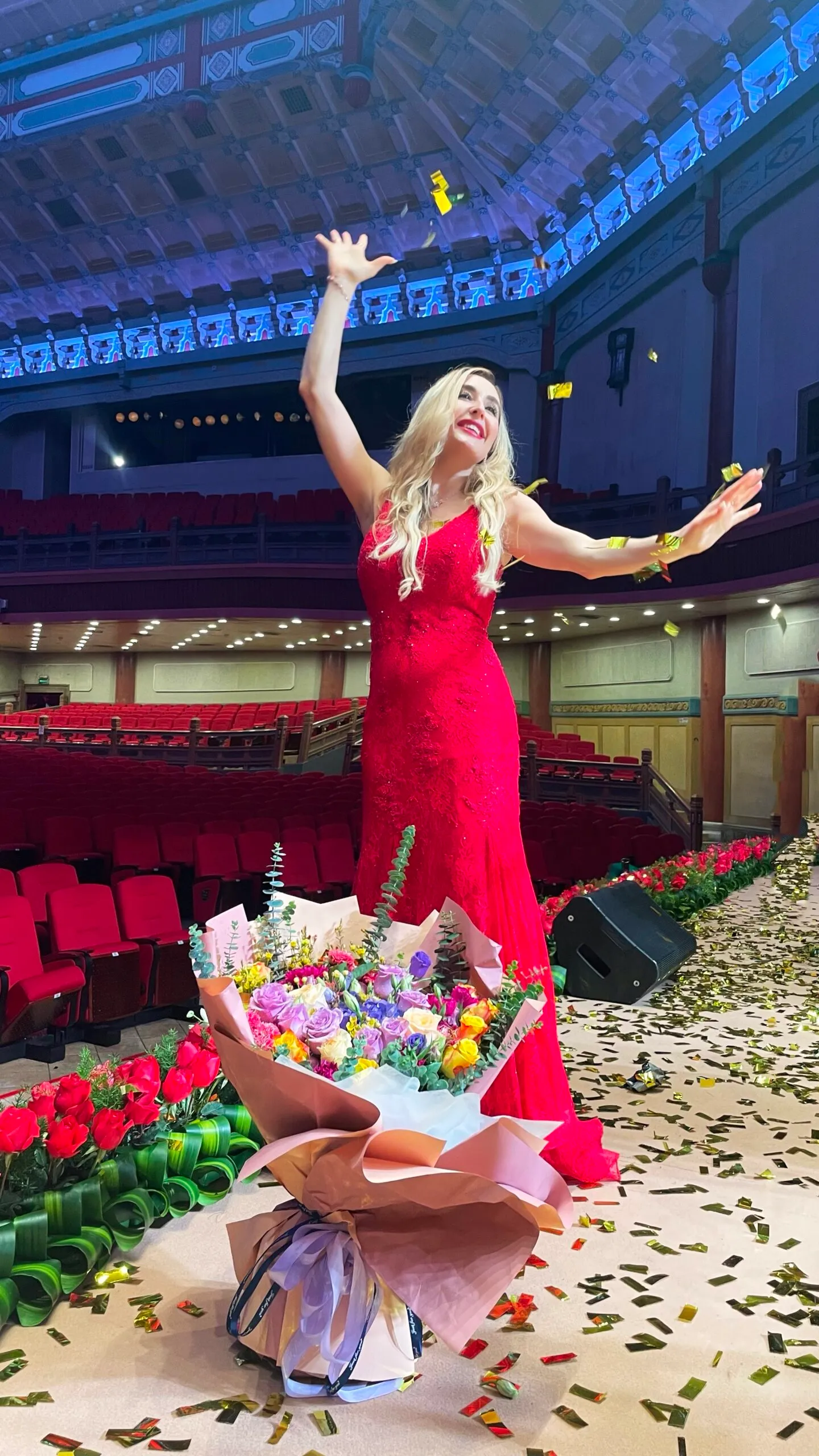 Venicia Rasmussen curtain call in red gown